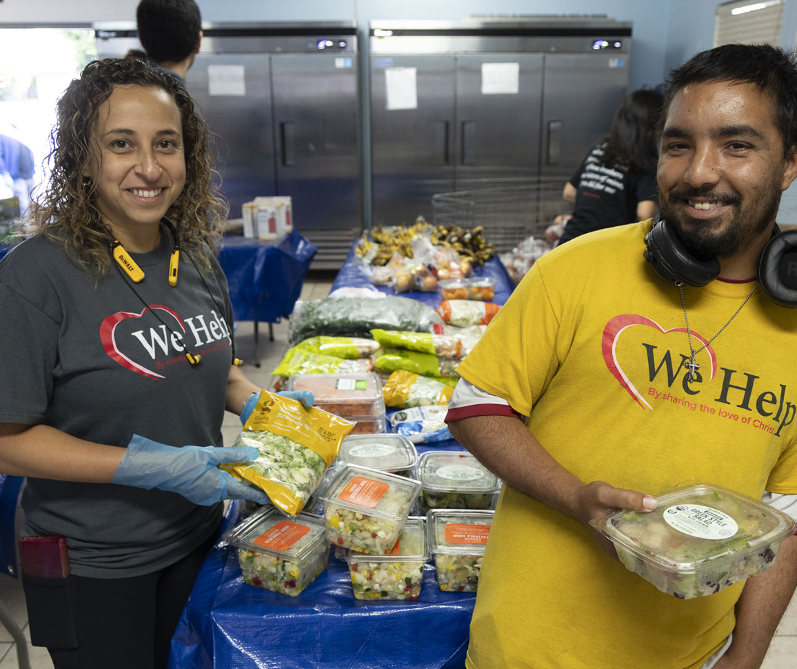 Volunteers packing potatoes